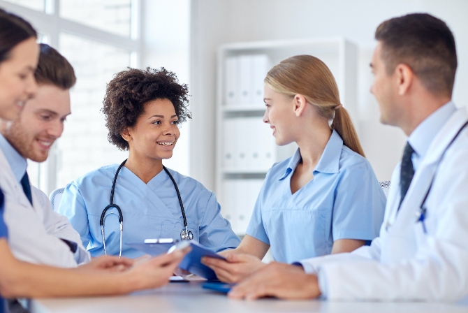 a group of nurses talking