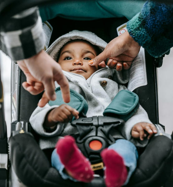 Parents with a baby in a stroller