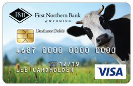 VISA business debit card with a black and white cow